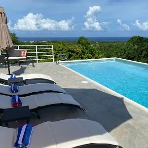 https://runaway-to-tranquility-overlooking-the-bay.comcaribbean.com